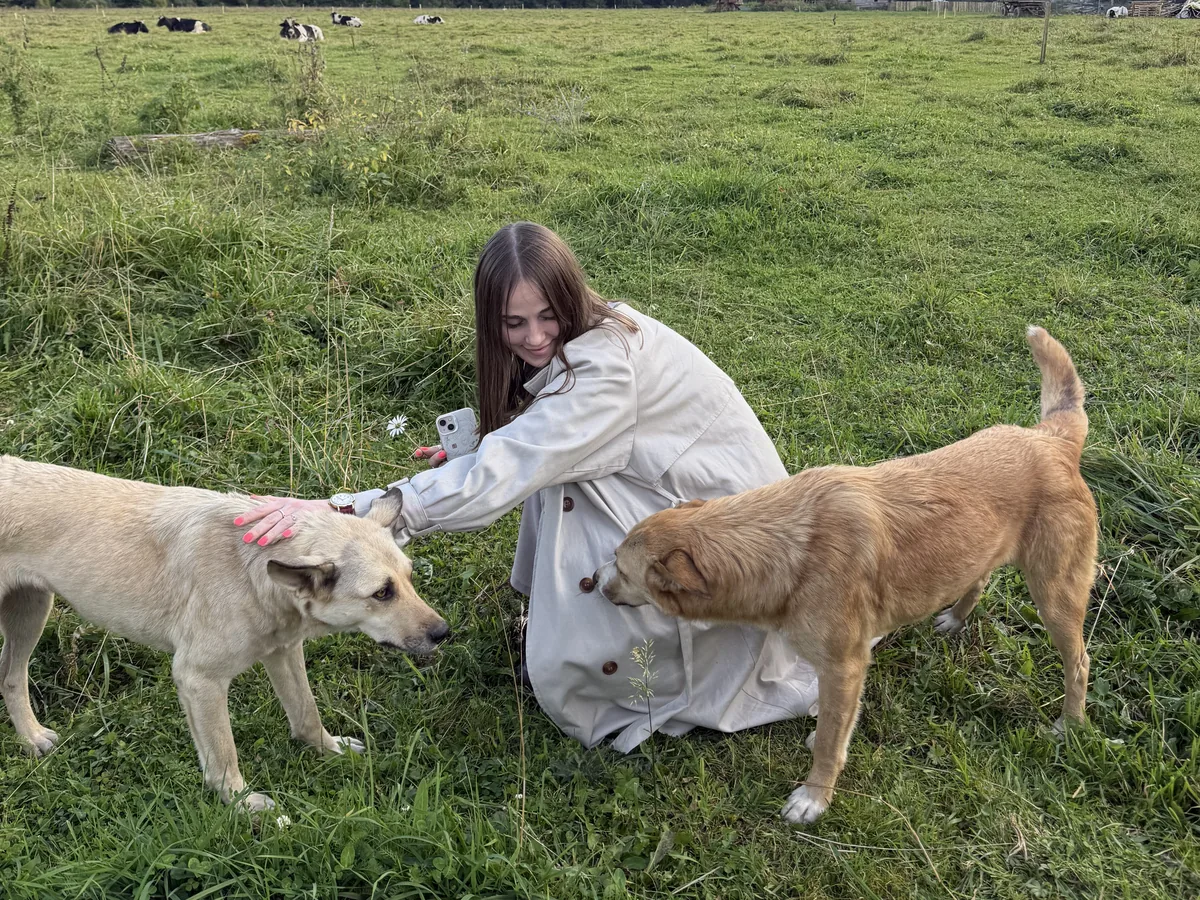 Liliia spending time with dogs outdoors