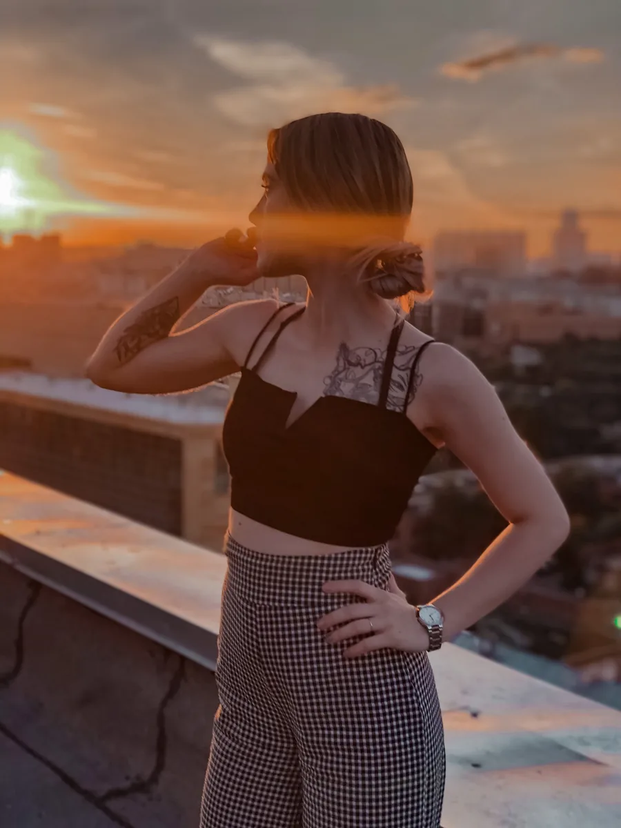 Liliia on a rooftop at sunset